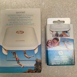 Brand new HP Sprocket + refill paper